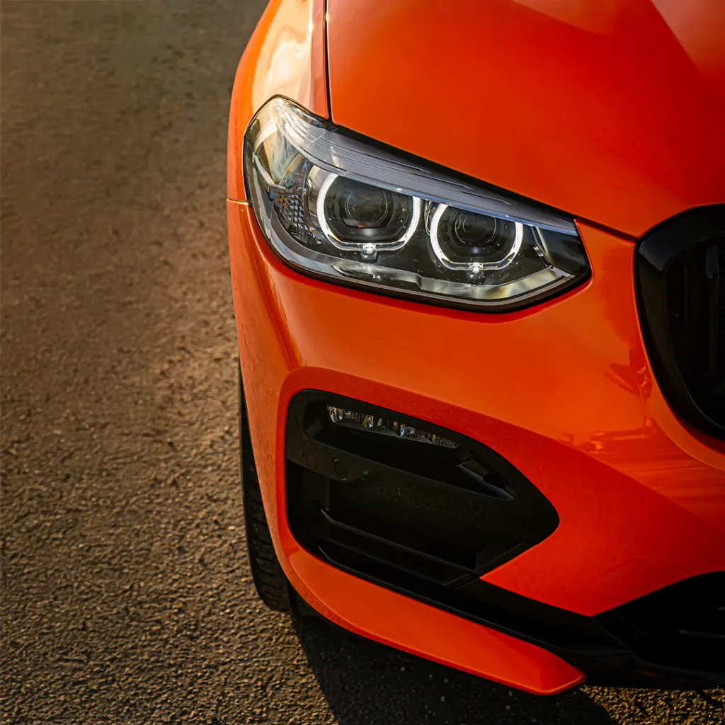 EVOLV-PPF-Electric-Tangerine-bmw-headlightt.webp
