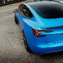 EVOLV_bomber_blue_color_ppf_tesla_closeup_back.webp