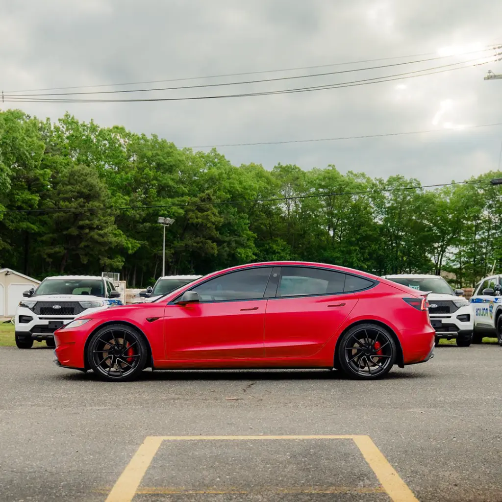 EVOLV_inferno_red_color_ppf_tesla_sideview2.webp