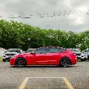 EVOLV_inferno_red_color_ppf_tesla_sideview2.webp