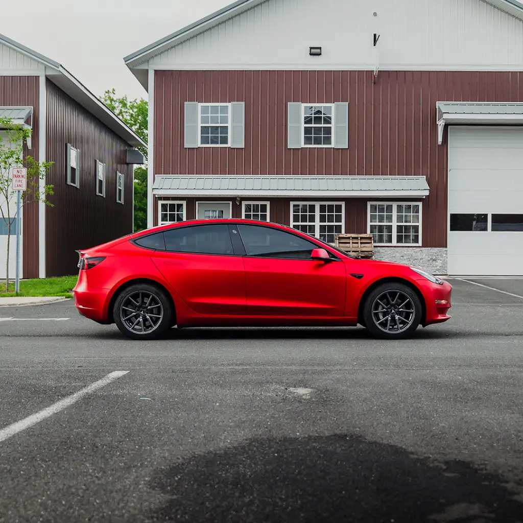 EVOLV-Inferno-Red-PPF-Tesla-Model3-side.webp